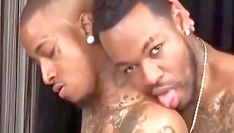 Tattooed chick with a large goatee gets fucked by her black boss
