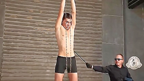 Hot blonde girl in a black mask is in bondage porn