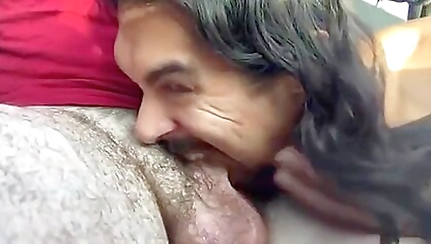 Brunette girl in a bikini gets a cumshot in her mouth