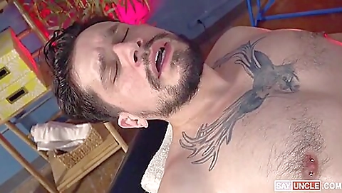 Beautiful brunette with tattoos fucked on the massage table