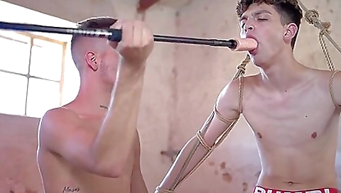 Bondage sex video showing a hot female wearing shoes in a dungeon