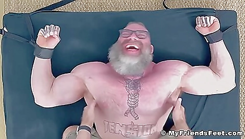 Amateur bondage fetish porn video with a bound bearded stud