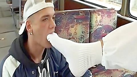 A gorgeous chick rides a man on a sneaker while having a facial