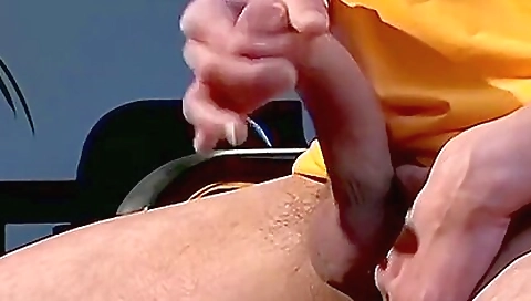 horny guy smokes a cigarette while fucking with a dildo